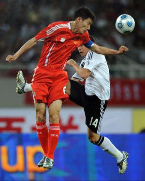 A new Chinese national soccer team stunned European powerhouse Germany with a deserved 1-1 draw at an international friendly at the Shanghai Stadium here on Friday.