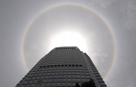 Photo taken on May 30, 2009 shows the view of a solar halo in Chengdu, capital of southwest China's Sichuan Province. The rare phenomenon of a solar halo appeared in the sky over Chengdu between 1 p.m. and 2 p.m. on Saturday. (Xinhua/Jiang Hongjing)