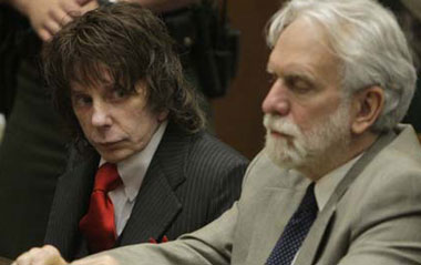 Music producer Phil Spector (L) sits in court with his attorney Dennis Riordan at the Los Angeles Superior Court, during his sentencing for the February 2003 shooting death of actress Lana Clarkson May 29, 2009. Spector was given a sentence of 19 years to life in prison on Friday for the murder of the Hollywood actress in 2003.