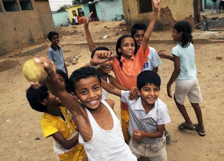 Children play at a slum in New Delhi, India, on May 29, 2009. The Oscar-winning film 