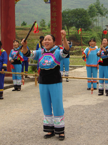 A Tujia singer leads the welcome chorus