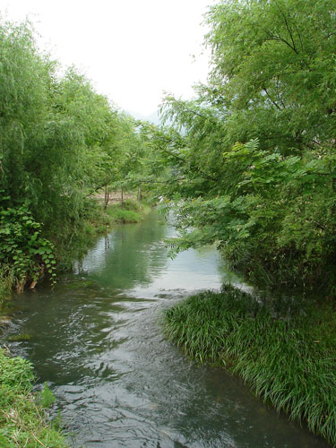  The river that winds its course around the village