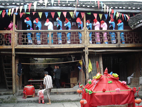 Maids of honor at a Tujia wedding ceremony