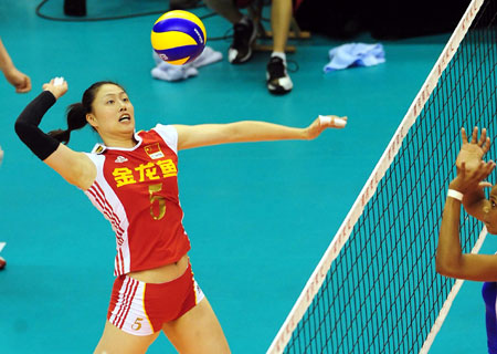 China's Ma Yunwen spikes the ball during a match between China and Cuba at the 2009 Chinese Women's Volleyball Tournament in Luohe, a city of central China's Henan Province, May 31, 2009. China won 3-0, and got the champion of the tournament with all victories. (Xinhua/Wang Song)