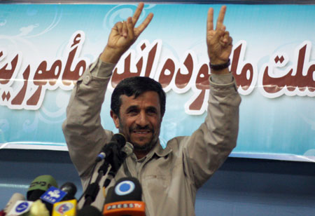 Iran's President Mahmoud Ahmadinejad gestures to his supporters at an election campaign in Tehran, May 31, 2009. Iranians will vote on June 12 in an election that pits hardline Ahmadinejad against two moderate challengers and one fellow-conservative. (Xinhua/Ahmad Halabisaz) 