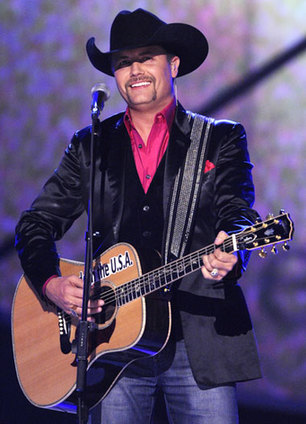 John Rich performs 'Amarillo by Morning' at the ACM Artist of the Decade All Star Concert in honor of George Strait in Las Vegas.