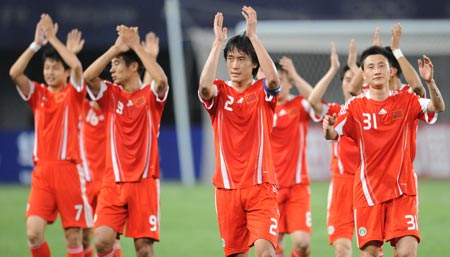 China's players gesture after the friendship soccer match between the national teams of China and Iran in Qinhuangdao, a city in north China's Hebei Province, June 1, 2009. China won 1-0. (Xinhua/Yang Shiyao)