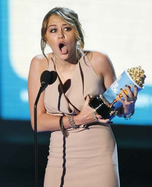 Miley Cyrus wins Best Song from a Movie for "The Climb" in "Hannah Montana: the Movie" at the 2009 MTV Movie Awards in Los Angeles May 31, 2009.