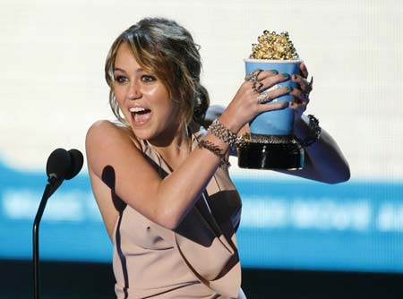 Miley Cyrus wins Best Song from a Movie for "The Climb" in "Hannah Montana: the Movie" at the 2009 MTV Movie Awards in Los Angeles May 31, 2009. 