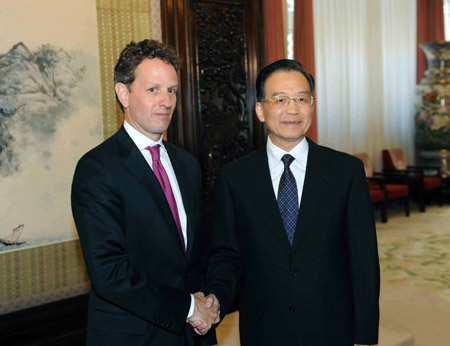 Chinese Premier Wen Jiabao (R) meets with visiting U.S. Treasury Secretary Timothy Geithner in Beijing, capital of China, June 2, 2009.