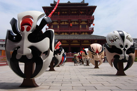 Various feature masks are laid down inside the just-opened Prime Minister Cao Cao&apos;s Official Compound, during the 3rd Three Kingdoms Cultural Week, in the Xudu Capital Park, in Xuchang City, central China&apos;s Henan Province, June 1, 2009. 