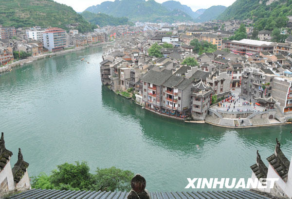 This picture taken on May 29 shows the ancient town of Zhenyuan in southwest China's Guizhou province. The small town, with a history of over 2,200 years, is dubbed as 'Venice in the east', with the Wuyang river winding through it. [Photo:Xinhuanet]