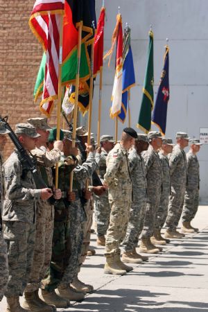 U.S. soldiers attend a ceremony to mark a transfer of authority of U.S. military forces in charge of several provinces in eastern Afghanistan, at Bagram air base, some 60 km north of Kabul, capital of Afghanistan, June 3, 2009.