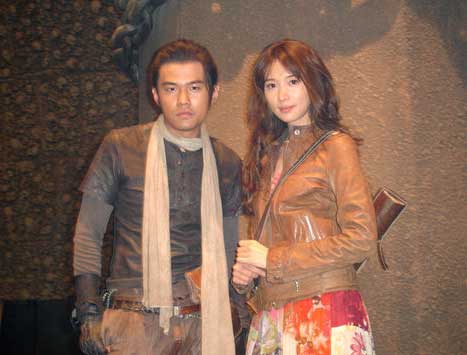 Taiwan pop star Jay Chow and supermodel Lin Chi-ling pose for photos on the set of adventure film 'Ci Ling' on June 3, 2009. 'Ci Ling' tells a story of time and space shuttle, without detailing the exact time slots and places for the whole story.