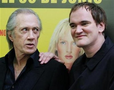 In this file photo U.S. film director Quentin Tarantino (R) and U.S. actor David Carradine pose during the presentation of their latest movie 'Kill Bill Vol. 2' at a Madrid hotel June 21, 2004. Carradine, who starred as the wandering monk in the long-running Kung Fu television series, has died in Bangkok, the U.S. embassy said on Thursday. 