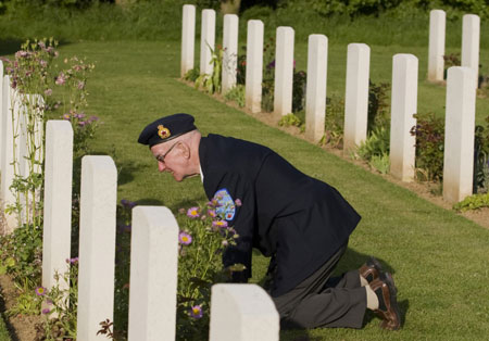 Canadian veteran of the Normandy D-Day invasion Windsor Macdonald, 84, of Moncton, N.B., visits for the first time the grave of his brother 65 years after he was killed, at the Canadian war cemetery in Beny-sur-Mer June 5, 2009.