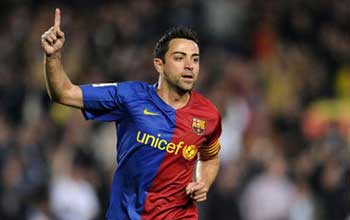Xavi is the engine of this Barcelona team.)