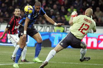 The now-departed Adriano sees Inter past Milan in controversial circumstances.