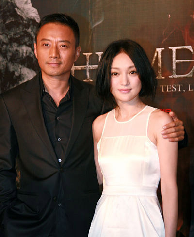 Cast members Zhang Hanyu (left) and Zhou Xun promote the upcoming spy thriller 'The Message' in Beijing on June 7, 2009. 