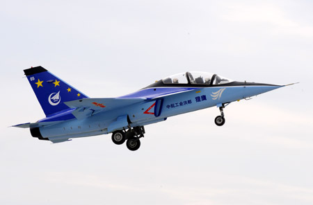 The L15-05 trainer plane, developed by the Hongdu Aviation Industry Group takes off at Qingyunpu airport in Nanchang, east China's Jiangxi Province, June 8, 2009. [Song Zhenping/Xinhua]