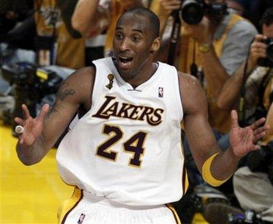 Los Angeles Lakers guard Kobe Bryant (24) reacts to losing possession of the ball to the Orlando Magic during overtime at Game 2 of the NBA basketball finals Sunday, June 7, 2009, in Los Angeles. The Lakers won 101-96.[Matt Sayles/CCTV/AP Photo] 