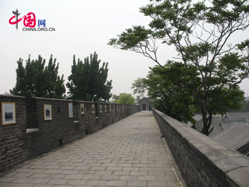 Photos exhibited on the two kilometer city wall 