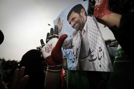 Supporters of Iranian President Mahmoud Ahmadinejad attend his last presidential campaign in Tehran, capital of Iran, on June, 10, 2009, prior to the upcoming 10th presidential election slated for Friday. [Zhang Ning/Xinhua] 