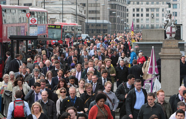 Commuters in Mile End, East London try to make their way into work this morning during a 48 hour tube strike. [CFP]