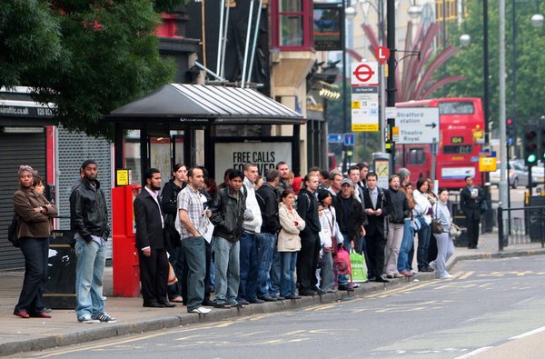 Commuters in Mile End, East London try to make their way into work this morning during a 48 hour tube strike. [CFP]