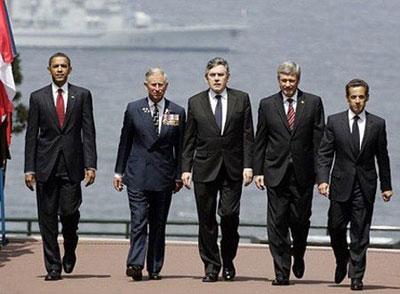 (L-R) U.S. President Barack Obama, Britain's Prince Charles, British Prime Minister Gordon Brown, Canadian Prime Minister Stephen Harper and France's President Nicolas Sarkozy arrive at the Colleville-sur-Mer cemetery to attend a ceremony to mark the 65th anniversary of the D-Day landings in Normandy, June 6, 2009.[Photo:CCTV.com]