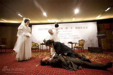 The theme posters of NCPC's first original drama production 'Jane Eyre' are released Wednesday at a press conference at the National Centre of Performing Arts (NCPC) on June 10, 2009. Lead cast members of 'Jane Eyre' performs a wedding scene during the press conference. Actress Yuan Quan and actor Wang Luoyong star as Jane Eyre, Rochester respectively in the drama.