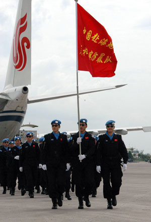 China's eighth riot police squad to Haiti on a peacekeeping mission for the United Nations arrive in Port-au-Prince, June 13, 2009. The 8th riot police squad will execute peacekeeping mission in the coming 8 months.[Yin Nan/Xinhua] 