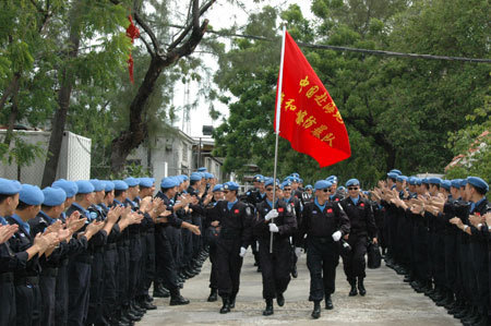 China's eighth riot police squad to Haiti on a peacekeeping mission for the United Nations arrive in Port-au-Prince, June 13, 2009. [Yin Nan/Xinhua]