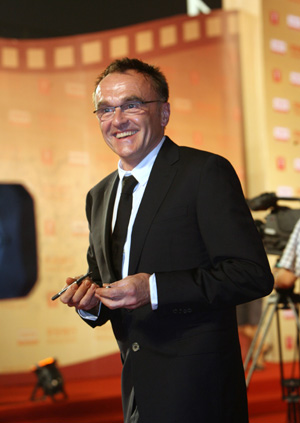 British director Danny Boyle who heads the international juries arrives for the opening ceremony of the 12th Shanghai International Film Festival in east China's Shanghai, June 13, 2009. [Liu Ying/Xinhua]