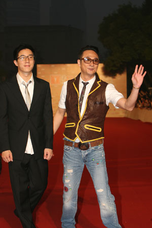 Actors Jaycee Chan (L) and Francis Ng attend the opening ceremony of the 12th Shanghai International Film Festival in Shanghai, east China, June 13, 2009.[Zhu Liangchengn/Xinhua]