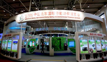 Photo taken on June 14, 2009 shows the display area of the China International Energy Saving and Environmental Protection Exhibition 2009 in Beijing, capital of China. The exhibition kicked off on Sunday and attracted over 250 enterprises from home and abroad. [Xinhua]