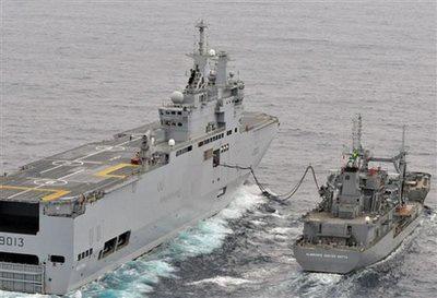 In this photo released by Brazil's Navy, Brazilian tanker 'Almirante Gastao Motta', right, and French Navy ship 'Mistral' are seen during search operations for victims of the Air France flight 447 in the Atlantic ocean, Saturday, June 13, 2009.[CCTV/AP Photo/Brazil's Navy] 