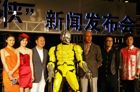 Cast members Gan Wei, Sun Li, director Jeffery Lau, robot KX, Hu Jun, Ronald Cheng and Alex Fong pose at a press conference in Shanghai on Sunday, June 14th, 2009.