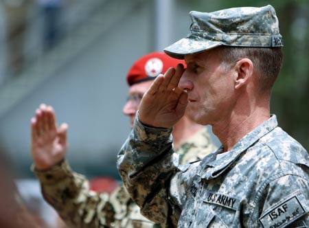 International Security Assistance Force (ISAF) commander, U.S. General Stanley McChrystal (R) and German General Egon Ramms salute during a change of command ceremony in Kabul, capital of Afghanistan, June 15, 2009. New commander of the NATO-led ISAF in Afghanistan U.S. General Stanley McChrystal has vowed to accelerate security and development in the war-torn country, a statement of the alliance released here Monday said. [Xinhua]