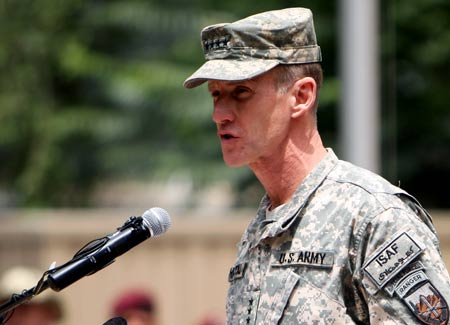 International Security Assistance Force (ISAF) commander, U.S. General Stanley McChrystal speaks during a change of command ceremony in Kabul, capital of Afghanistan, June 15, 2009. New commander of the NATO-led ISAF in Afghanistan General Stanley McChrystal has vowed to accelerate security and development in the war-torn country, a statement of the alliance released here Monday said. [Zabi Tamanna/Xinhua]