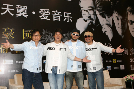 A tetrad of Chinese well-known singers Dai Yau Law, Chow Wah Kin, Chang Chen-yue, and Jonathan Lee (from L to R) pose for photos on the press meeting for their Super Band Concert scheduled on July 11 at the Hongkou Stadium, in Shanghai, east China, June 15, 2009.[Zhu Liangcheng/Xinhua] 