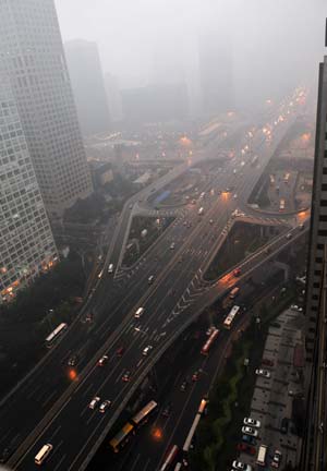 Photo taken on June 16, 2009 shows general view of Guomao bridge in Beijing, China. Local authority released a yellow alert for lightings on Tuesday. [He Junchang/Xinhua]