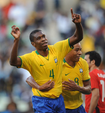 Brazil's Juan (L) celebrates his goal during a Group B match between Brazil and Egypt at the FIFA Confederations Cup in Bloemfontein, South Africa, June 15, 2009. (Xinhua/Yang Lei) 