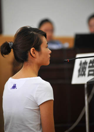 Deng Yujiao is seen at a local court in Badong County, central China's Hubei Province, June 16, 2009. 