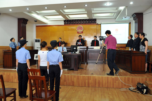 Deng Yujiao is seen at a local court in Badong County, central China's Hubei Province, June 16, 2009.