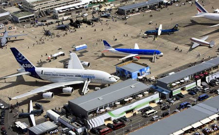 Aeroplanes are seen in the aerial view photo taken during the 48th international Paris Air Show at Le Bourget airport in Paris, France, June 17, 2009. [Zhang Yuwei/Xinhua] 