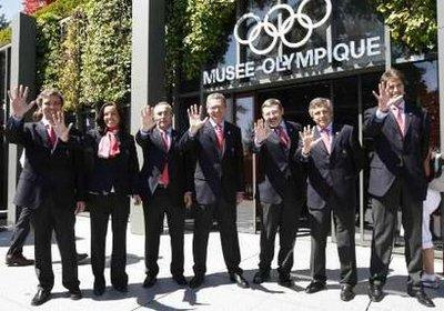 Members of Madrid 2016 pose for photographers before presenting their candidature to the International Olympic Committee (IOC) members during the third briefing for IOC members on the candidature for the 2016 Olympic Games at the Olympic museum in Lausanne June 17, 2009.[CCTV/REUTERS/POOL/Dominic Favre SWITZERLAND SPORT OLYMPICS]