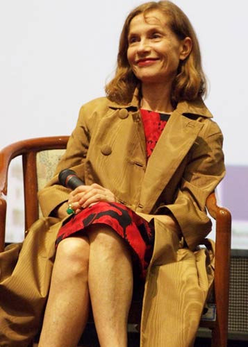 French actress Isabelle Huppert talks to Chinese movie fans at the China Film Archive on June 18, 2009.