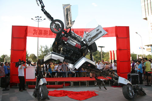 A model of a transformer, modified from a Jetta Sedan, is unveiled in Beijing on Tuesday, June 23, 2009 to mark the debut of the sci-fi film 'Transformers: Revenge of the Fallen.'