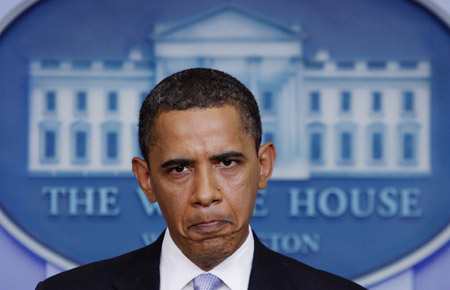 U.S. President Barack Obama listens to questions during a news conference in the Brady Press Briefing Room of the White House in Washington, June 23, 2009.